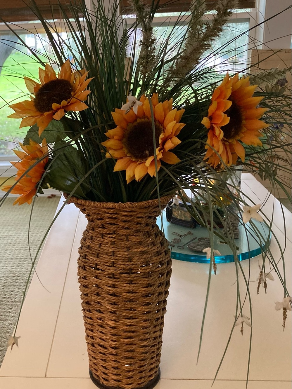 Woven Seagrass Vase with Orange Sunflower Arrangement